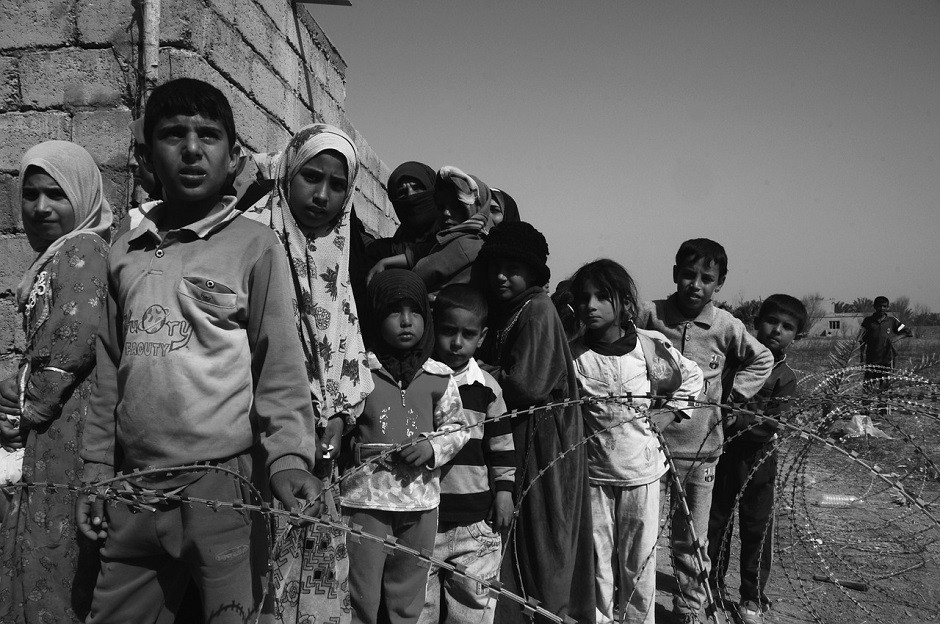 Niños comida campo refugiados
