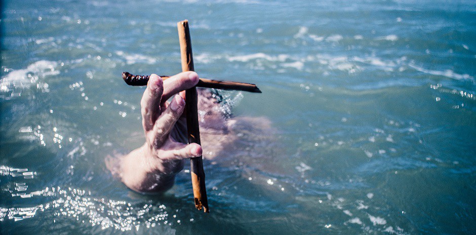 cristianos agua cruz bautismo 940x468